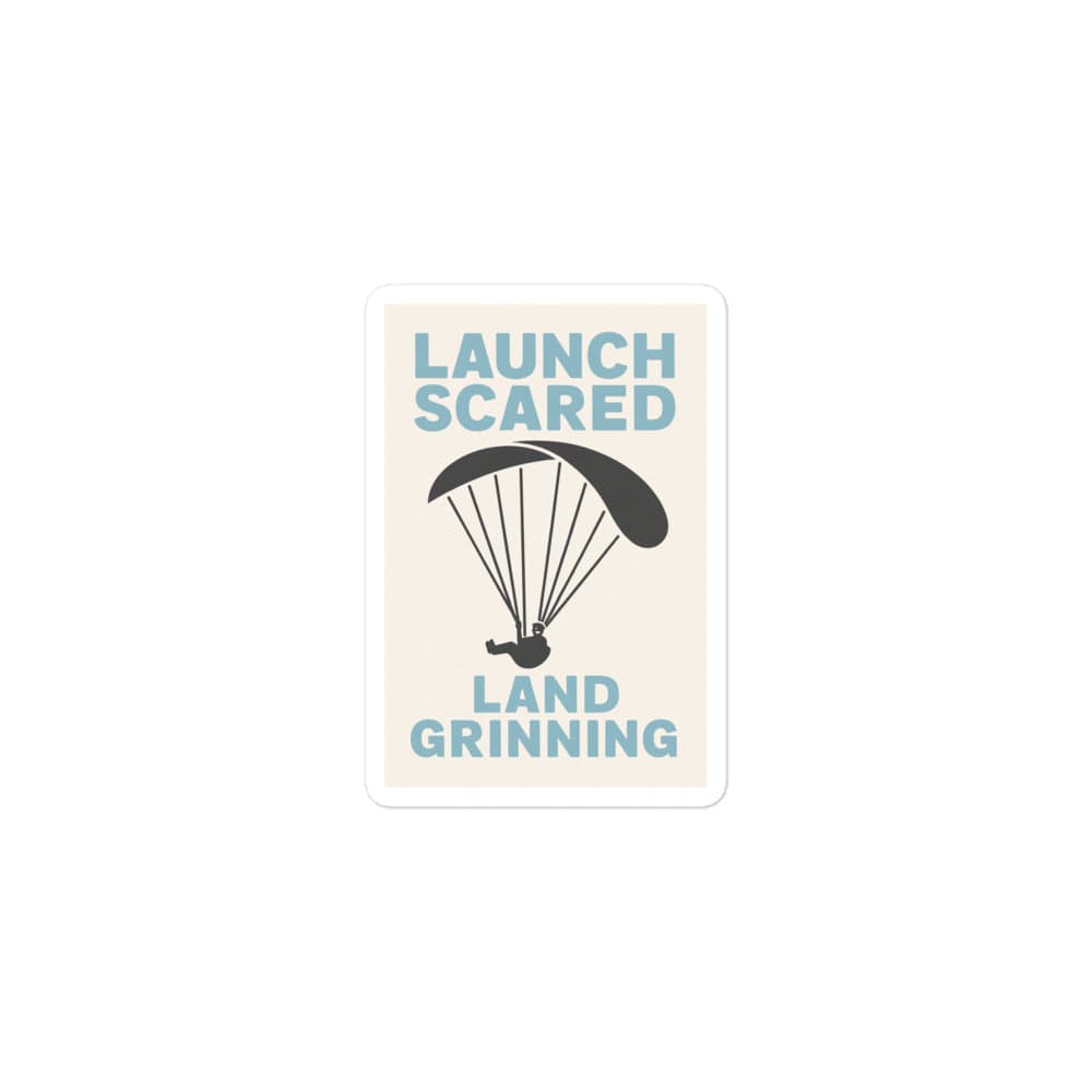 LAUNCH & FLIGHT CO. STICKER 3″×3″ Launch Scared, Land Grinning | Paragliding Sticker